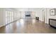 Large open space features wood floors, white shutters, fireplace, and modern decor at 6335 Mount Eden Ave, Las Vegas, NV 89139
