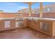 Inviting outdoor kitchen featuring a built-in grill and stainless steel appliances on a spacious patio at 6335 Mount Eden Ave, Las Vegas, NV 89139