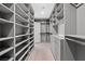 Spacious walk-in closet featuring custom shelving and ample storage space at 6335 Mount Eden Ave, Las Vegas, NV 89139