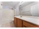 Bright bathroom featuring a bathtub-shower combo and a tiled floor at 6527 Belgrave Hall Ln, Las Vegas, NV 89122