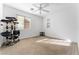 Bare bedroom with a cat tree and natural light streaming through the window at 6527 Belgrave Hall Ln, Las Vegas, NV 89122