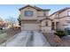 Charming two-story home featuring a two-car garage and low-maintenance landscaping at 6527 Belgrave Hall Ln, Las Vegas, NV 89122