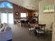 A clubhouse area features a full kitchen, seating at the breakfast bar and an adjacent dining area for residents at 6705 Squaw Mountain Dr # 102, Las Vegas, NV 89130