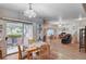 Bright dining area with sliding glass doors to an outdoor patio, perfect for enjoying meals with a view at 6705 Squaw Mountain Dr # 102, Las Vegas, NV 89130