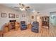 Spacious living room with hardwood floors, comfortable seating, and ample space for relaxing and entertaining at 6705 Squaw Mountain Dr # 102, Las Vegas, NV 89130