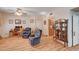 Cozy living room with hardwood floors, comfortable seating, and natural light creates a relaxing atmosphere at 6705 Squaw Mountain Dr # 102, Las Vegas, NV 89130