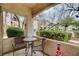 Cozy patio with seating, offering an intimate setting for outdoor relaxation and views at 6705 Squaw Mountain Dr # 102, Las Vegas, NV 89130