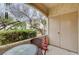 Private patio area with a table and chairs, offering a peaceful outdoor retreat at 6705 Squaw Mountain Dr # 102, Las Vegas, NV 89130