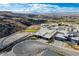 Modern homes with desert landscaping and mountain views in a desert community at 677 Overlook Rim Dr, Henderson, NV 89012
