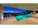 Relaxing backyard featuring an infinity pool with stunning views of the city skyline at 677 Overlook Rim Dr, Henderson, NV 89012