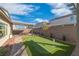 Beautiful backyard featuring a putting green, perfect for golf enthusiasts at 7177 W Camero Ave, Las Vegas, NV 89113