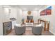 Comfortable bonus room with a refreshment bar, modern decor, laminate floor, and neutral colors at 7177 W Camero Ave, Las Vegas, NV 89113