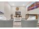 Cozy living space with neutral paint, laminate floors, and recessed lighting, perfect for relaxing at 7177 W Camero Ave, Las Vegas, NV 89113