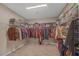 Organized walk-in closet with ample shelving and hanging space, providing efficient storage solutions at 7177 W Camero Ave, Las Vegas, NV 89113
