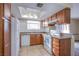 Well-lit kitchen featuring a window with natural light, modern appliances and spacious granite countertops at 7300 Pirates Cove Rd # 2093, Las Vegas, NV 89145