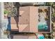 An aerial view displays the property's layout, including a terracotta roof, pool, and outdoor living spaces at 7466 Matilda St, Las Vegas, NV 89113