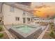 Outdoor oasis with a spa, pergola, and landscaped area perfect for entertaining at 7466 Matilda St, Las Vegas, NV 89113