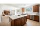 Bright kitchen with stainless steel appliances, center island, and plenty of counter space at 7466 Matilda St, Las Vegas, NV 89113