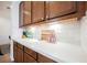 Kitchen countertop with white subway tile backsplash and ample storage at 7466 Matilda St, Las Vegas, NV 89113