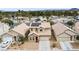 Aerial view of a neighborhood featuring a two-story home with solar panels and desert landscaping at 7652 Borealis St, Las Vegas, NV 89123