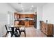 Eat-in kitchen featuring stainless steel appliances, and wooden cabinets at 7652 Borealis St, Las Vegas, NV 89123
