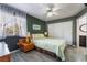 Comfortable bedroom features a ceiling fan, large closet, and an ensuite bathroom at 7950 W Flamingo Rd # 1037, Las Vegas, NV 89147