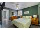 Spacious bedroom features a ceiling fan, neutral walls, and lots of natural light at 7950 W Flamingo Rd # 1037, Las Vegas, NV 89147