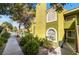Well-maintained condo building featuring lush landscaping and a private entrance at 7950 W Flamingo Rd # 1037, Las Vegas, NV 89147