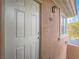 The exterior of the home features a front door with a door bell and house number at 817 Peachy Canyon Cir # 204, Las Vegas, NV 89144