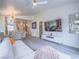 Spacious living room with wood floors, modern decor, and lots of natural light at 817 Peachy Canyon Cir # 204, Las Vegas, NV 89144