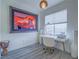 Inviting office space with a sleek desk, stylish decor, and ample natural light at 817 Peachy Canyon Cir # 204, Las Vegas, NV 89144