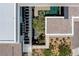 Aerial view of a modern home showcasing the unique architectural design and manicured landscaping at 9 Boulderback Dr, Henderson, NV 89012