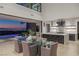 Open concept dining room with city views and modern kitchen at 9 Boulderback Dr, Henderson, NV 89012