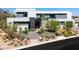 Modern home exterior with professional landscaping and contemporary design at 9 Boulderback Dr, Henderson, NV 89012