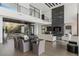 Elegant living area with fireplace, modern decor, and outdoor access at 9 Boulderback Dr, Henderson, NV 89012