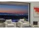 Chic living area featuring comfortable seating and panoramic views of the Las Vegas Strip at 9 Boulderback Dr, Henderson, NV 89012