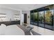View from the main bedroom showcasing an outdoor patio with desert landscaping at 9 Boulderback Dr, Henderson, NV 89012