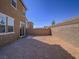 Backyard featuring a privacy wall, offering potential for outdoor customization at 10279 Fragrant Apple Ct, Las Vegas, NV 89141