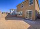 Large backyard features a brick privacy wall and space for landscaping at 10279 Fragrant Apple Ct, Las Vegas, NV 89141