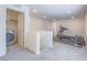 Open Bonus room features a laundry area and exercise equipment at 10279 Fragrant Apple Ct, Las Vegas, NV 89141