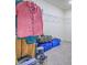 Walk-in closet with wire shelving, a full clothes rack, and carpet flooring at 10279 Fragrant Apple Ct, Las Vegas, NV 89141