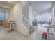Open entryway with tile floors, stairs, and a view of the living space at 10279 Fragrant Apple Ct, Las Vegas, NV 89141
