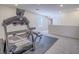 Home gym with exercise equipment like a treadmill and bench, perfect for fitness enthusiasts at 10279 Fragrant Apple Ct, Las Vegas, NV 89141