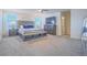 Spacious main bedroom features a large window and neutral decor at 10279 Fragrant Apple Ct, Las Vegas, NV 89141