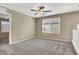 Bedroom features include carpet flooring and a window that allows plenty of natural light at 10802 Galveston Bay St, Las Vegas, NV 89179