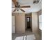 Bedroom showcasing carpet flooring, a ceiling fan, and a window with natural light at 1152 Gecko Rd, Henderson, NV 89002