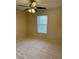 Bedroom filled with natural light with a ceiling fan at 1152 Gecko Rd, Henderson, NV 89002