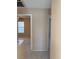 Upstairs hallway with views into two bedrooms at 1152 Gecko Rd, Henderson, NV 89002