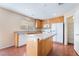 Efficient kitchen design featuring modern appliances, generous counter space, and a convenient center island for meal prep at 1152 Gecko Rd, Henderson, NV 89002