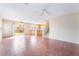 Open concept living area with tile flooring, connecting seamlessly to the kitchen and backyard access at 1152 Gecko Rd, Henderson, NV 89002